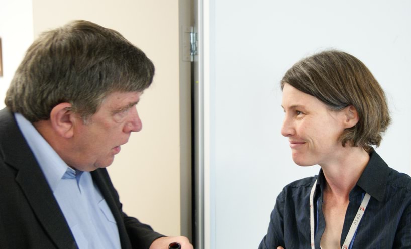 Paddy Harvey and Georgina Connelly are looking at each and having a conversation