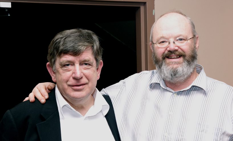 Paddy and John look at the camera at Paddy's 2010 retirement party