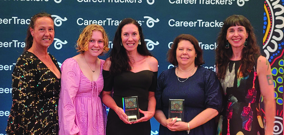 A group shot featuring VLA's two winners at the 2024 Career Trackers Gala Awards