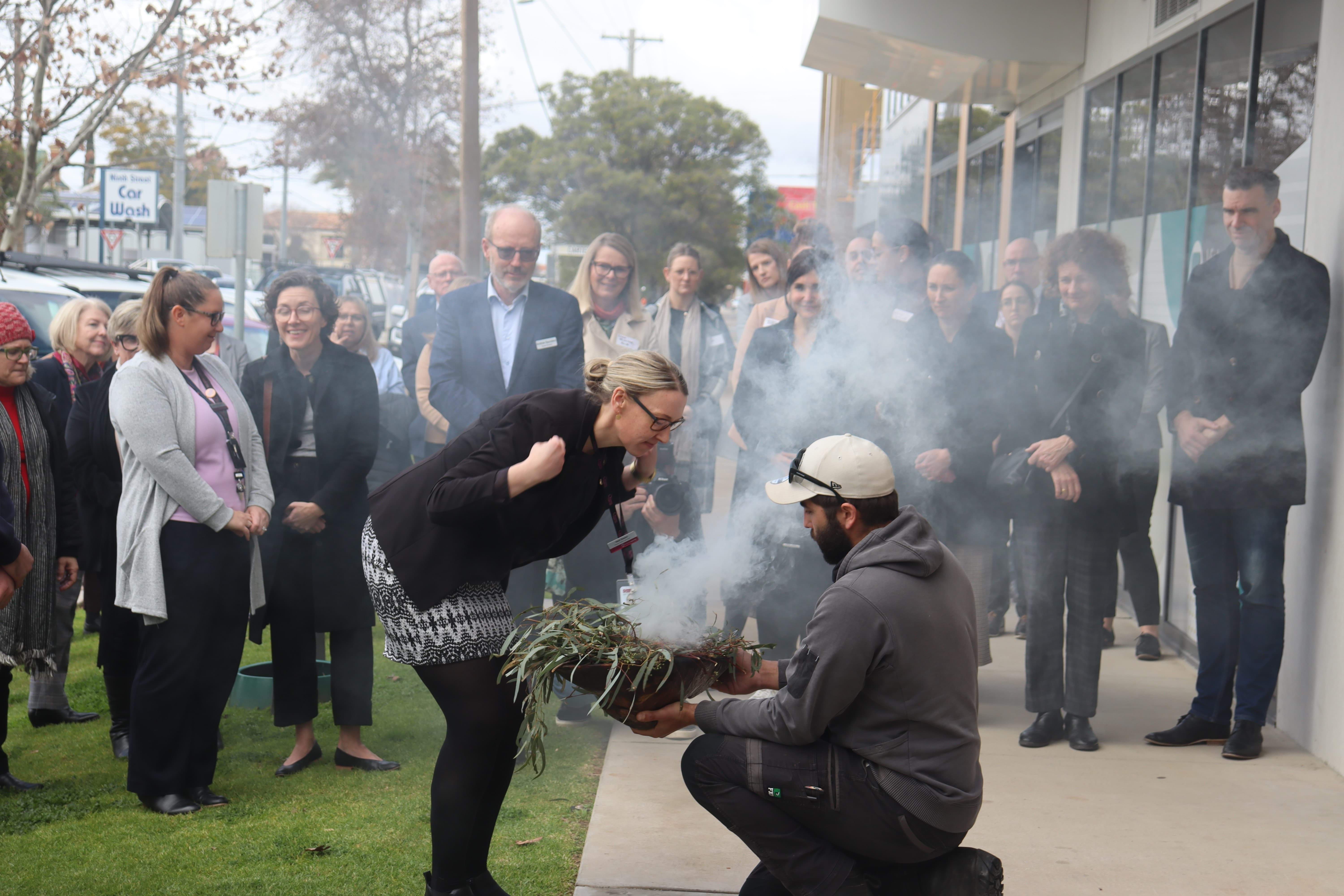Photo of smoking ceremony at opening of new Mildura office