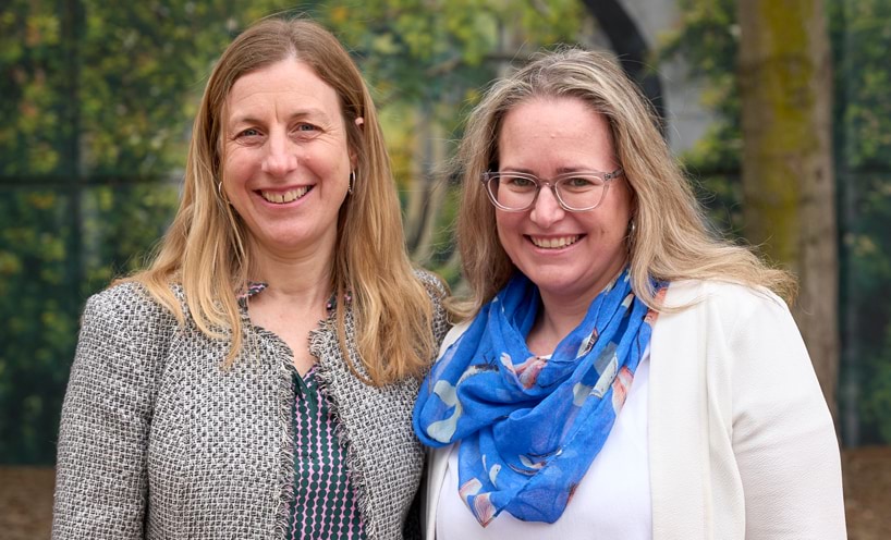 Portrait of Tara Bressan and Julie Riva smiling
